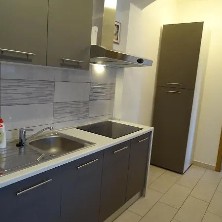 Orange & White Apartment Rovanjska